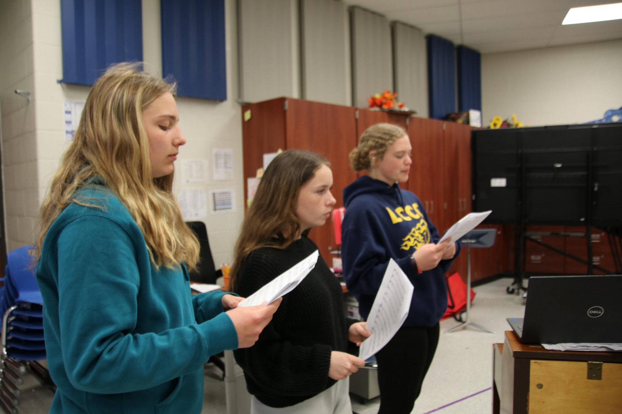 3 students reading