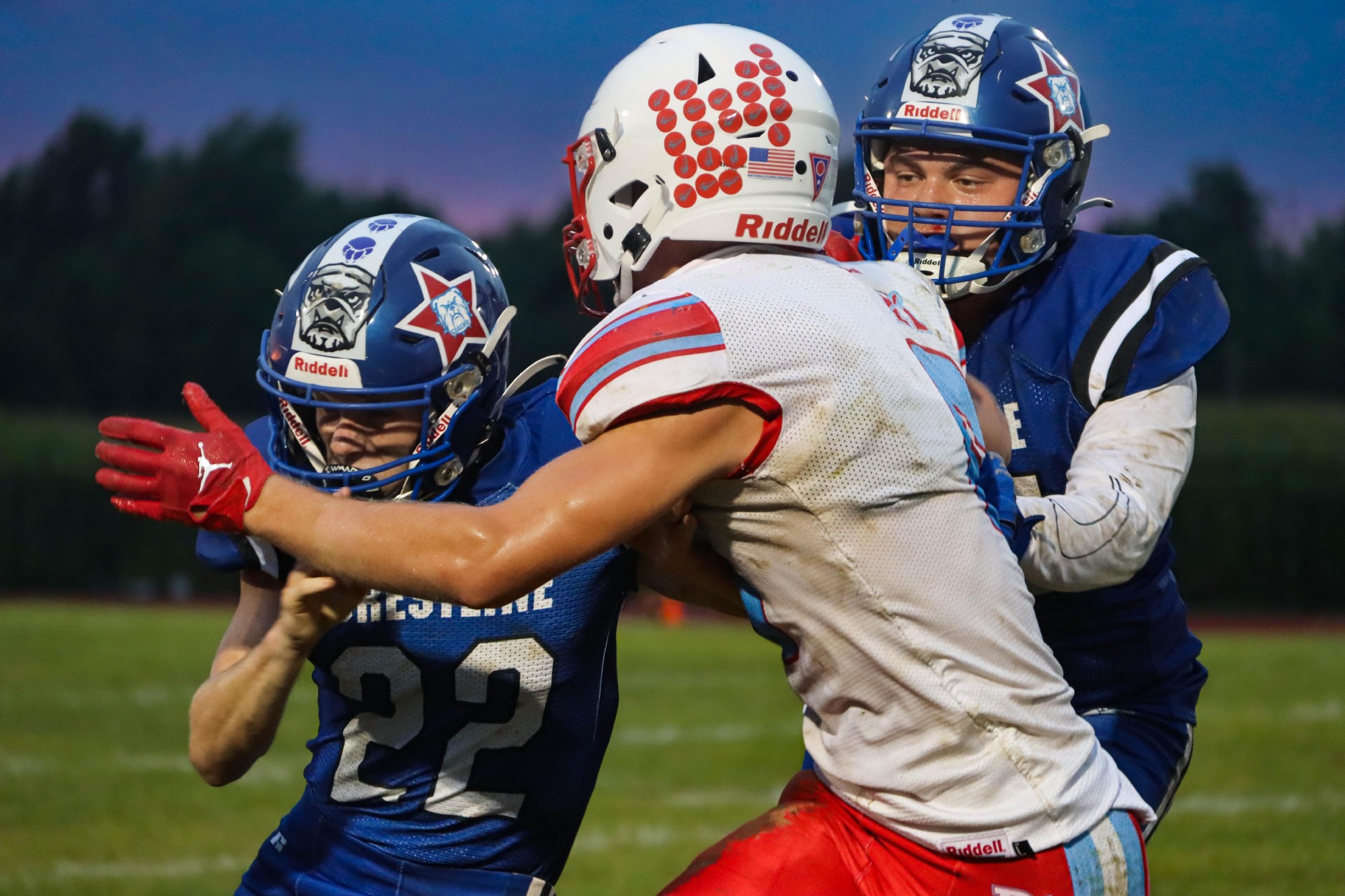 Footballplayers  playinmg on the field