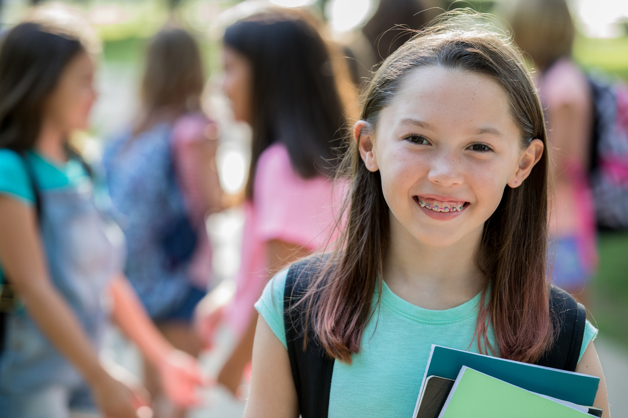 girl smiling posing for photo