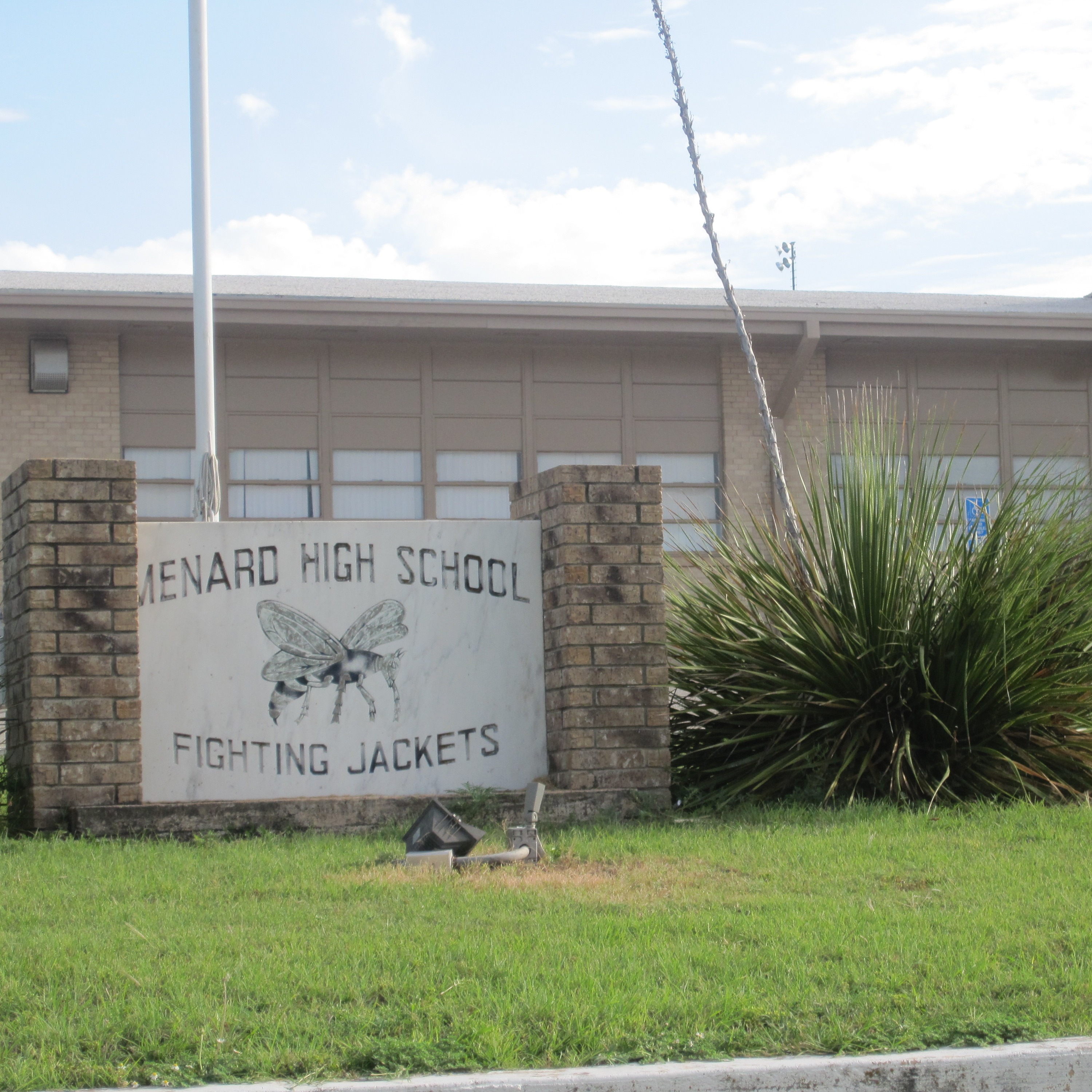 Menard High School Fighting Jackets exterior building and sign 