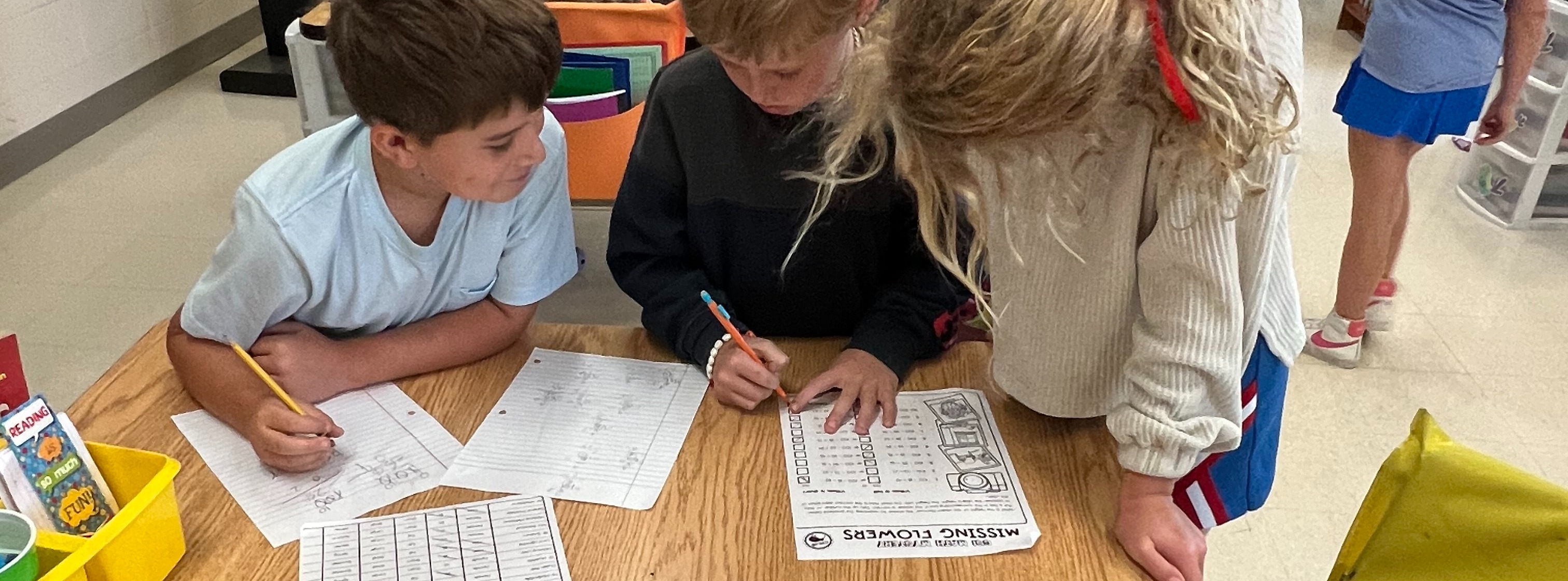 Three students working together
