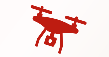 An all red graphic of a drone silhouette