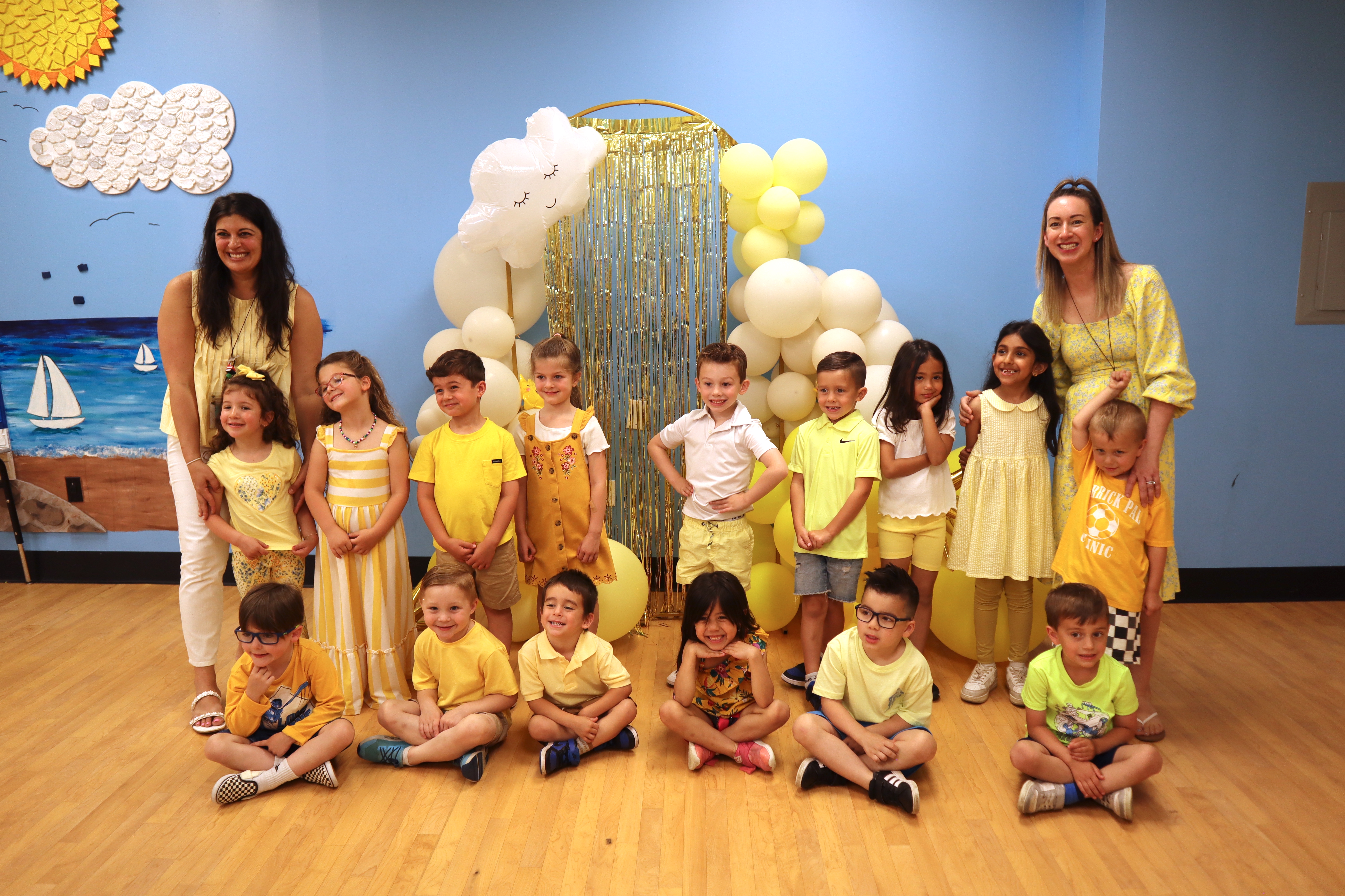 Students and teachers dressed in yellow.