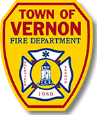 A shield-shaped emblem featuring the words 'TOWN OF VERNON FIRE DEPARTMENT' in bold red letters, with a central design that includes a tower and the year '1980'.