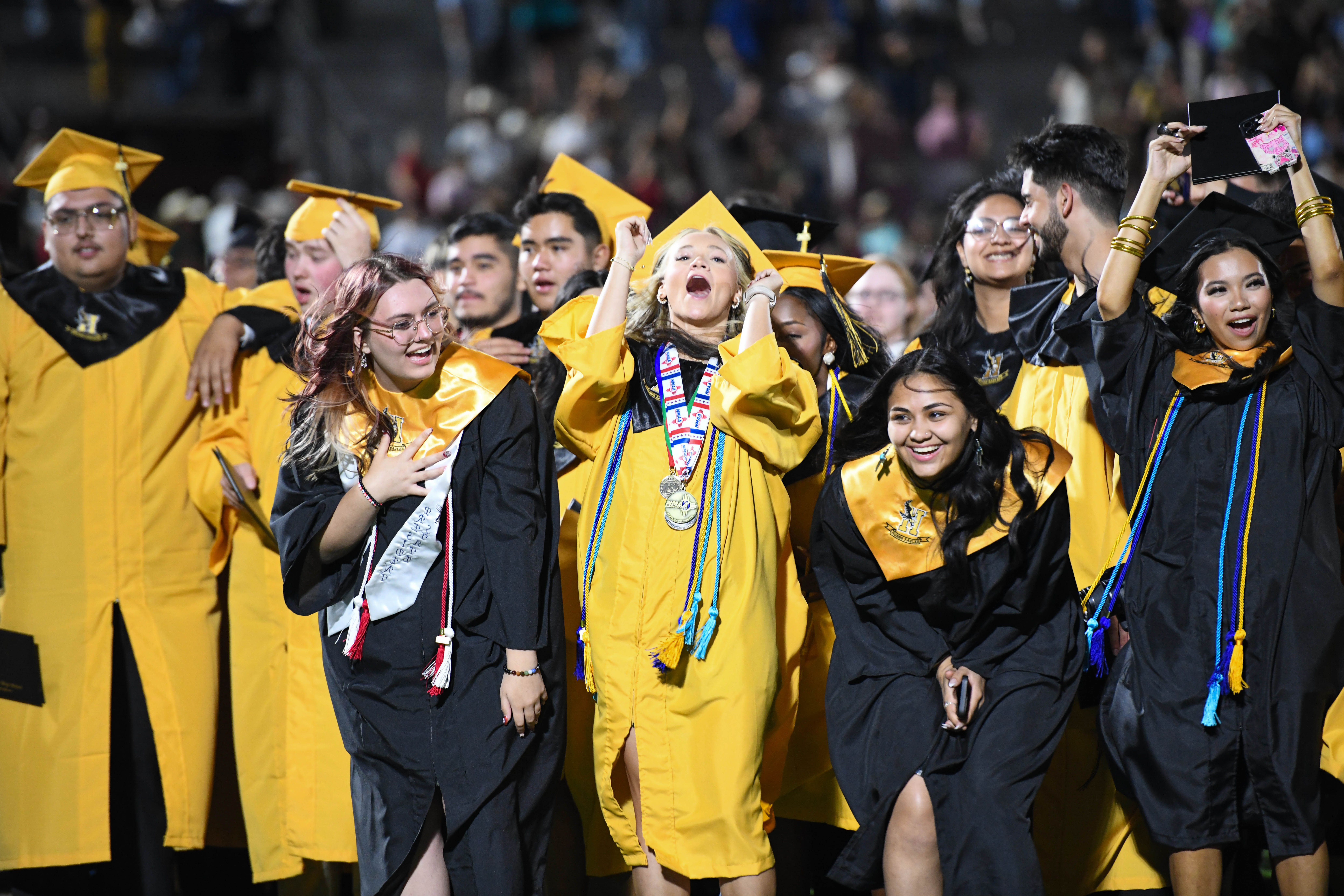 grads on field