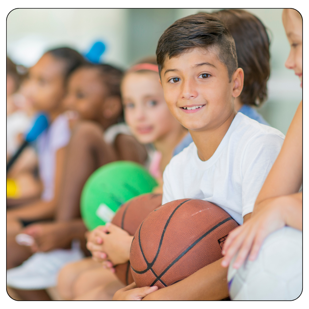 kid with basketball