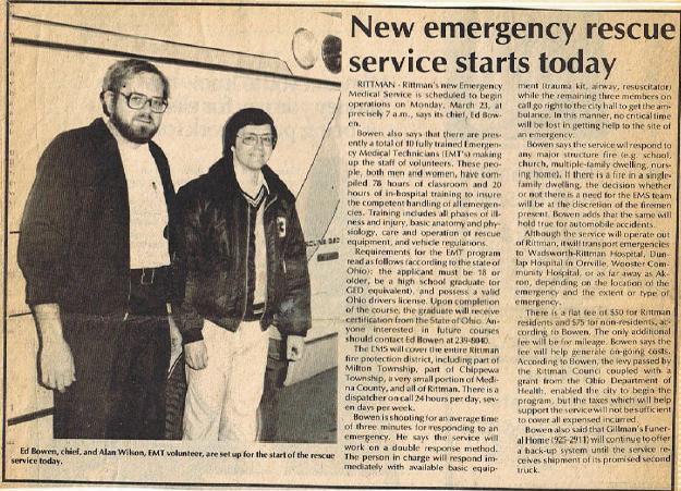 A newspaper article featuring two men standing together, announcing the start of a new emergency rescue service, with text detailing the service on the right side.