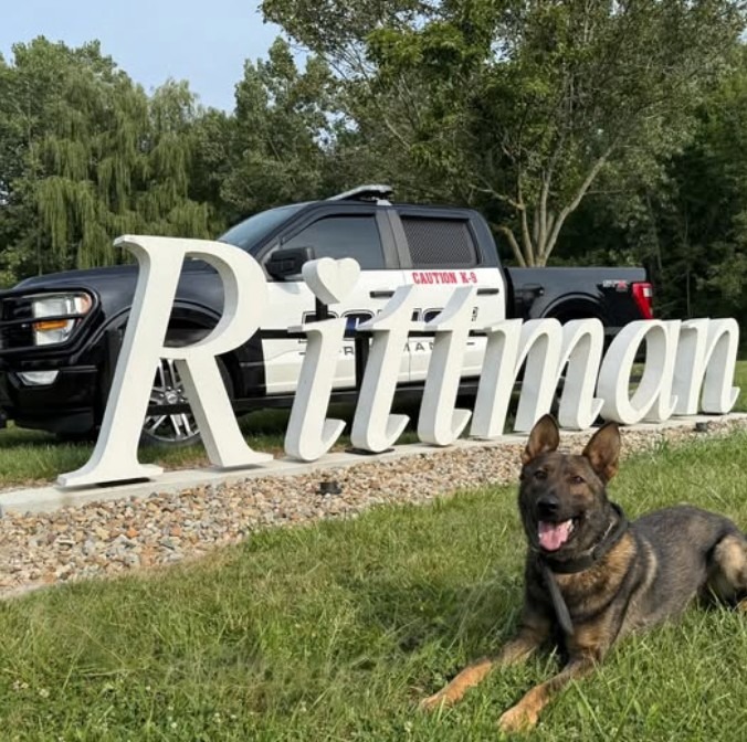 Rittman sign Drug Dog Pic