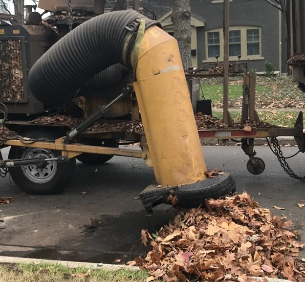 Leaf Collection Machine Truck collecting leaves