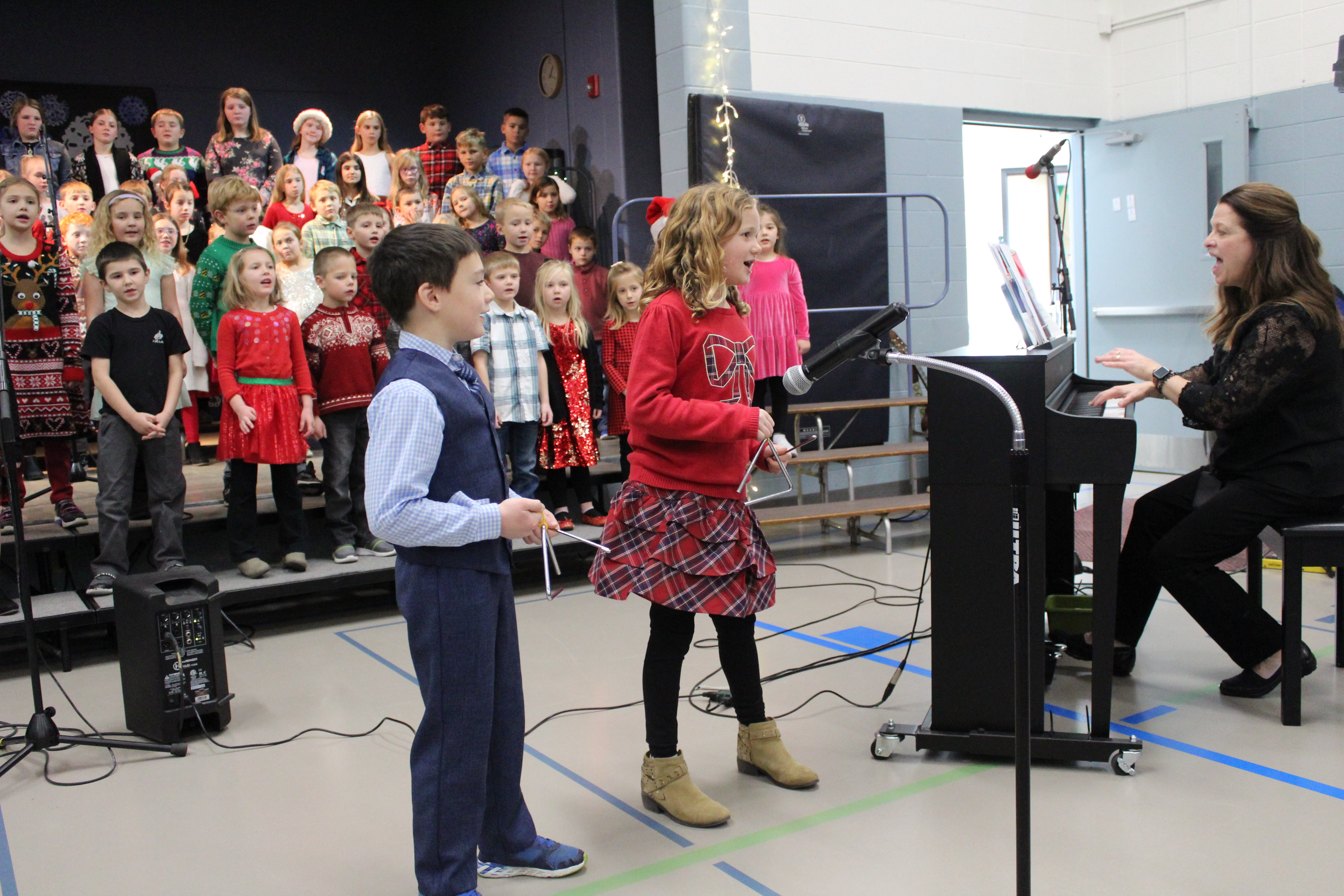 Kindergarten and 1st Grade Students singing at the 2024 Winter Concert