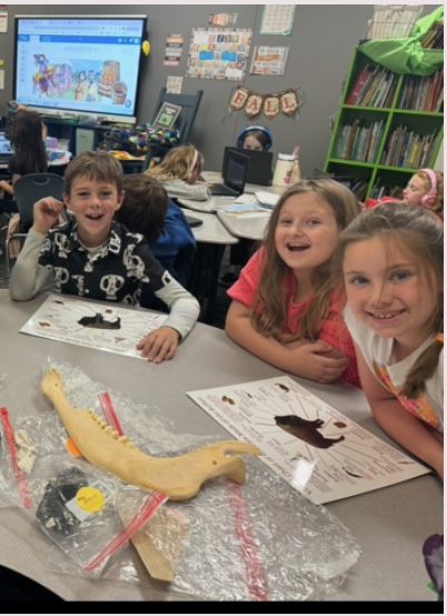 Three students from Ms. Crim's Class using the Buffalo Boxes.