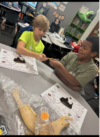 Two boys from Ms. Crim's Class using the Buffalo Boxes.