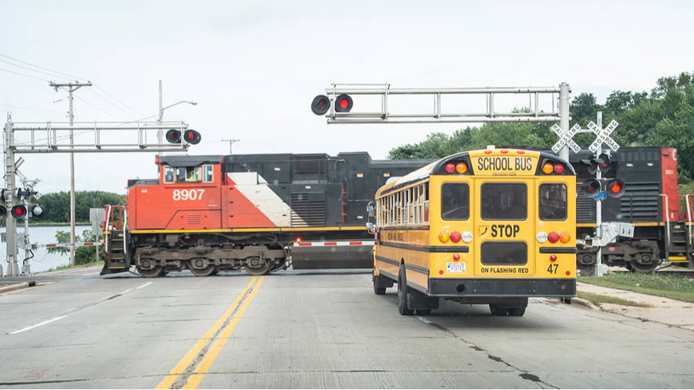 School Bus at Railway Crossing