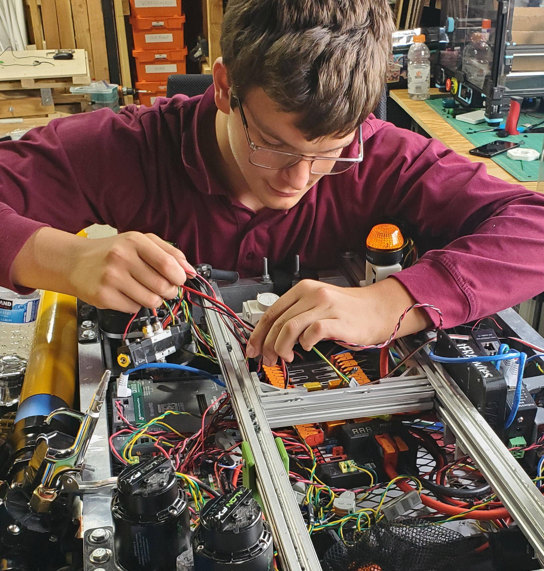 student working on a robot