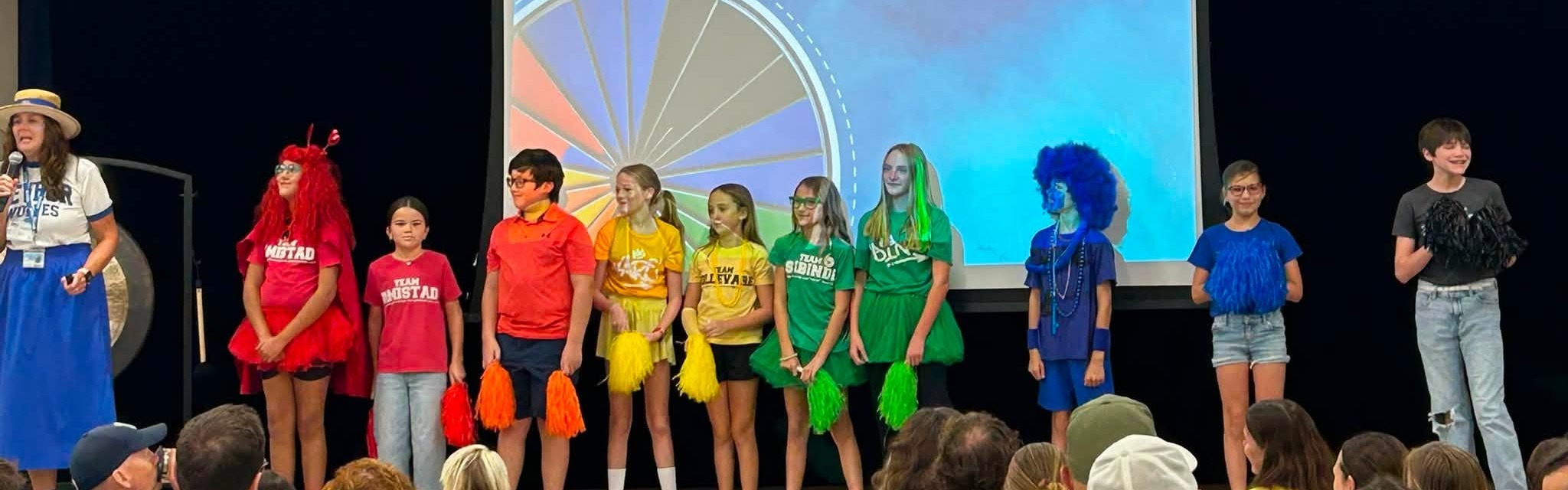 Harvey Houses Student Representatives on Stage