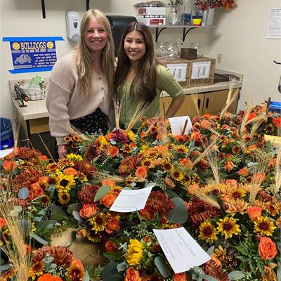 students with flowers 