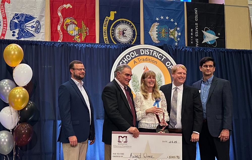 alum winning an award