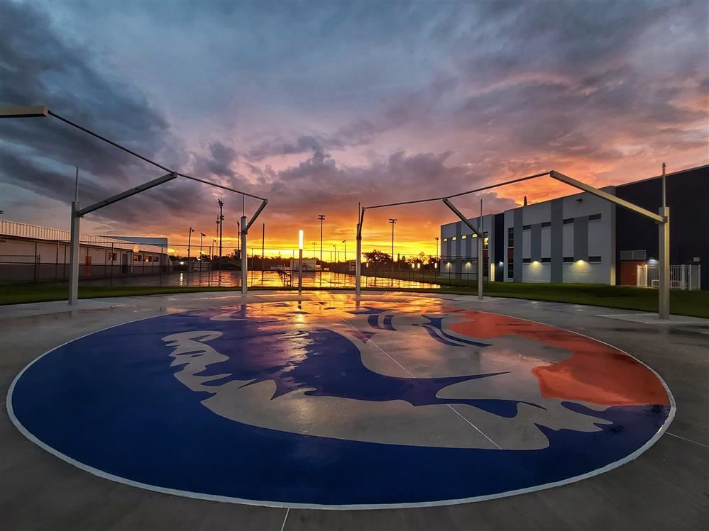 outdoor court on campus at sunrise