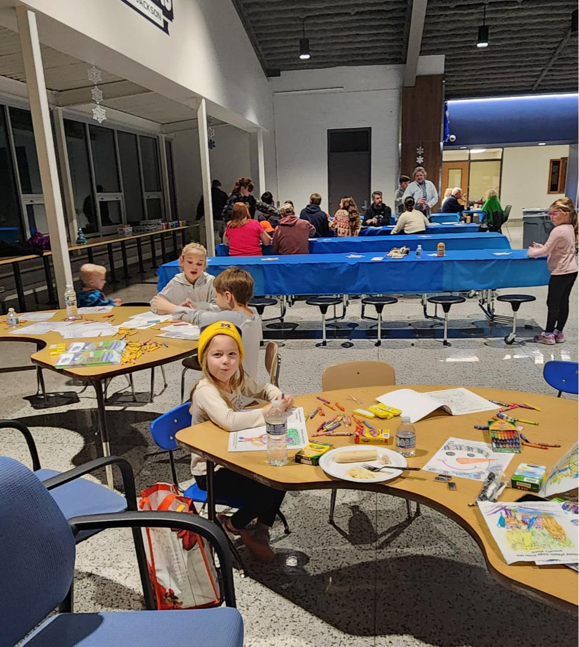 Children coloring at the EJCS Community dinner