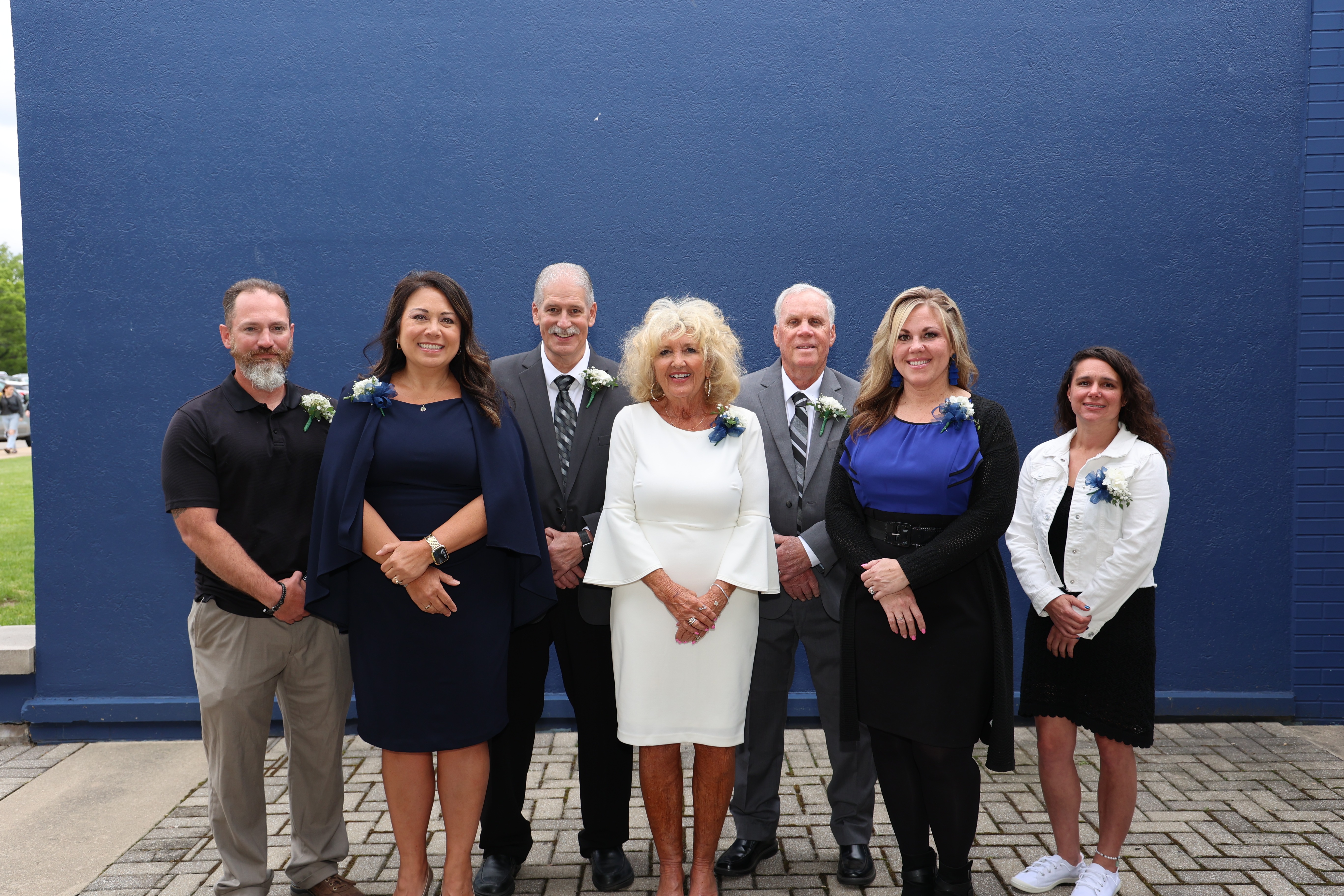 Four Women and three men from the school board