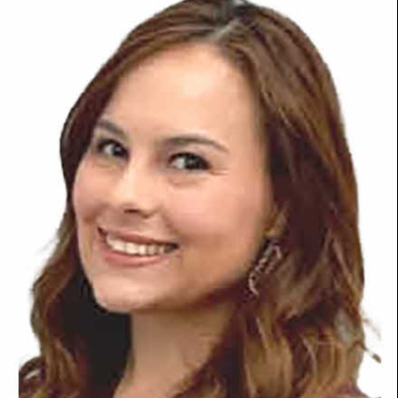 A woman with brown hair smiling