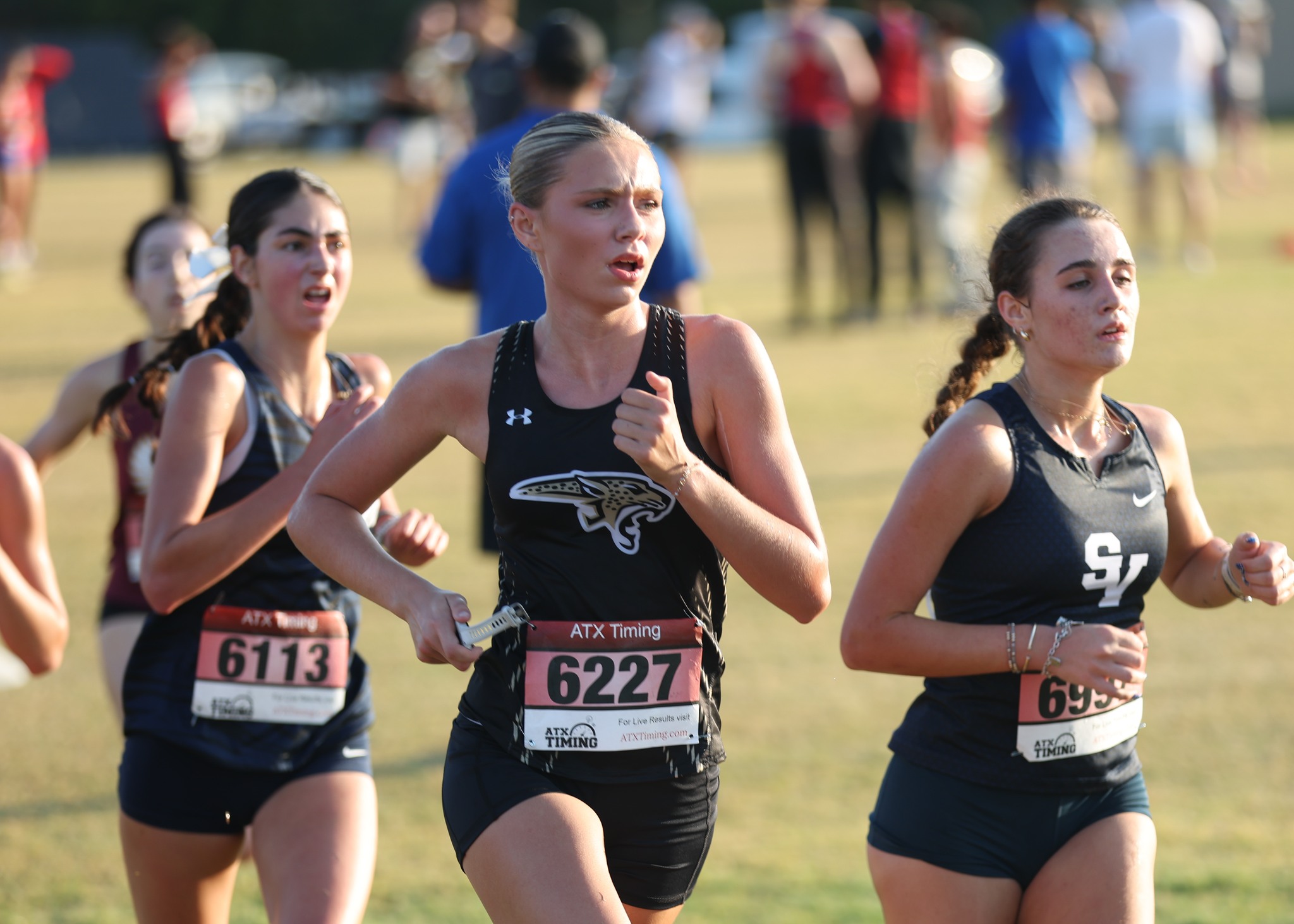 JHS athletes running for cross country
