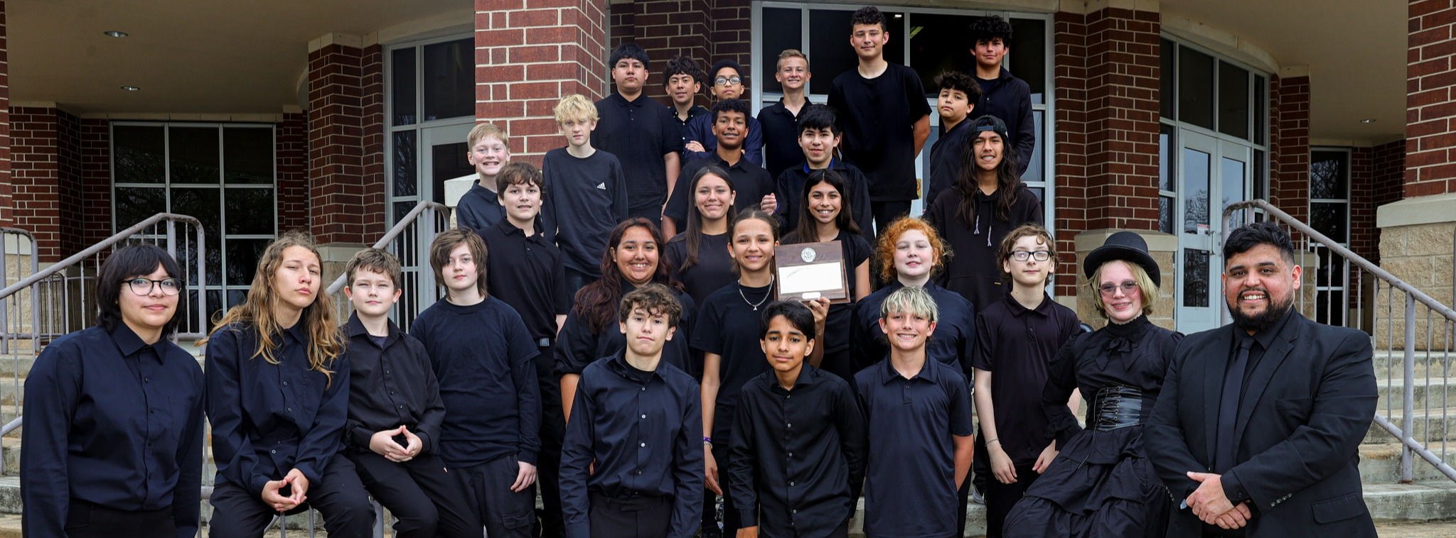 Barton Concert Band posed for a group photo outside of the Performing Arts Center