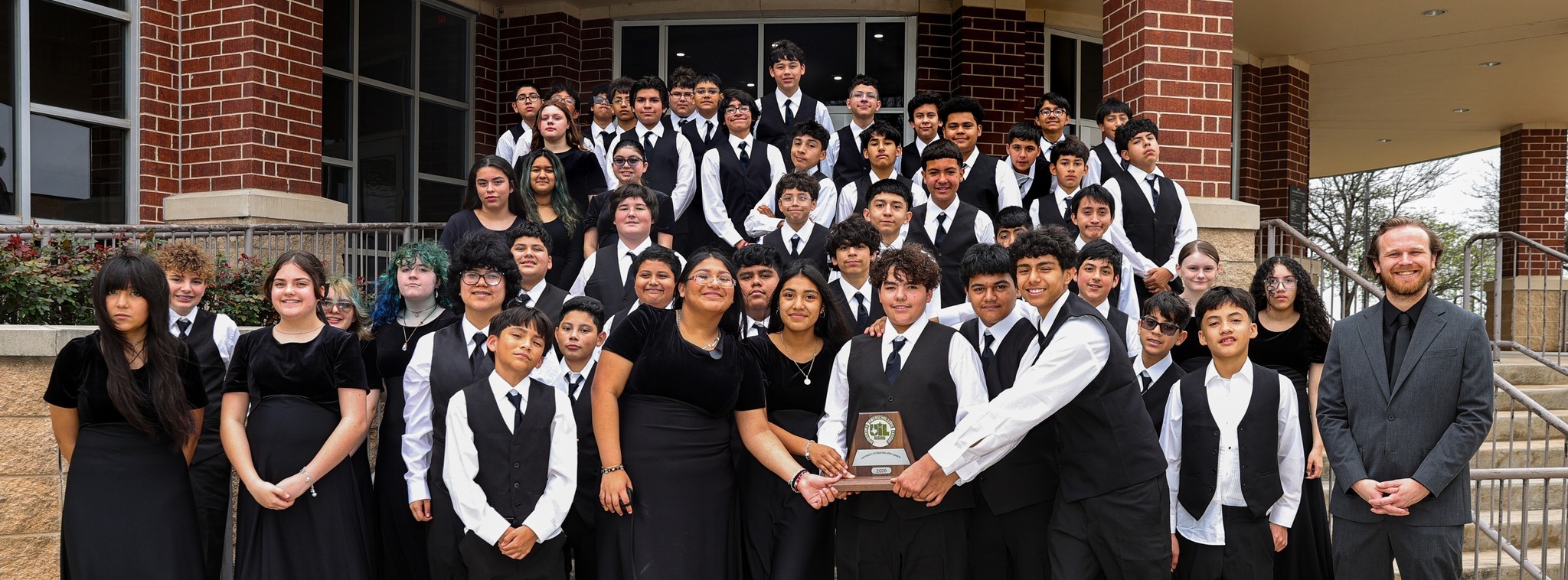 Tiger Concert Band posing for group photo outside of Performing Arts Center