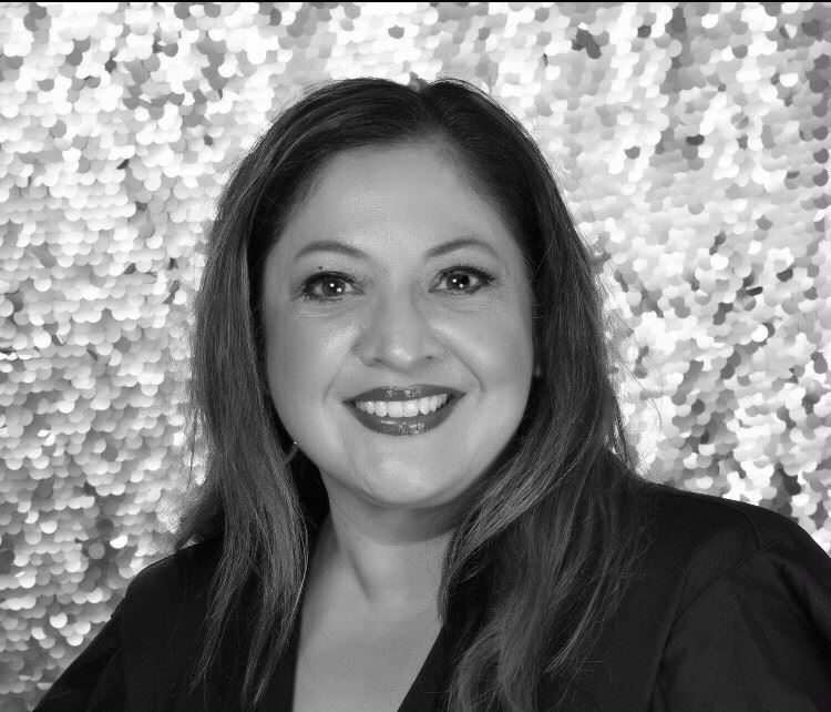 A woman smiling 