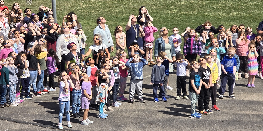 Barhitte Students and teachers watching the partial solar eclipse
