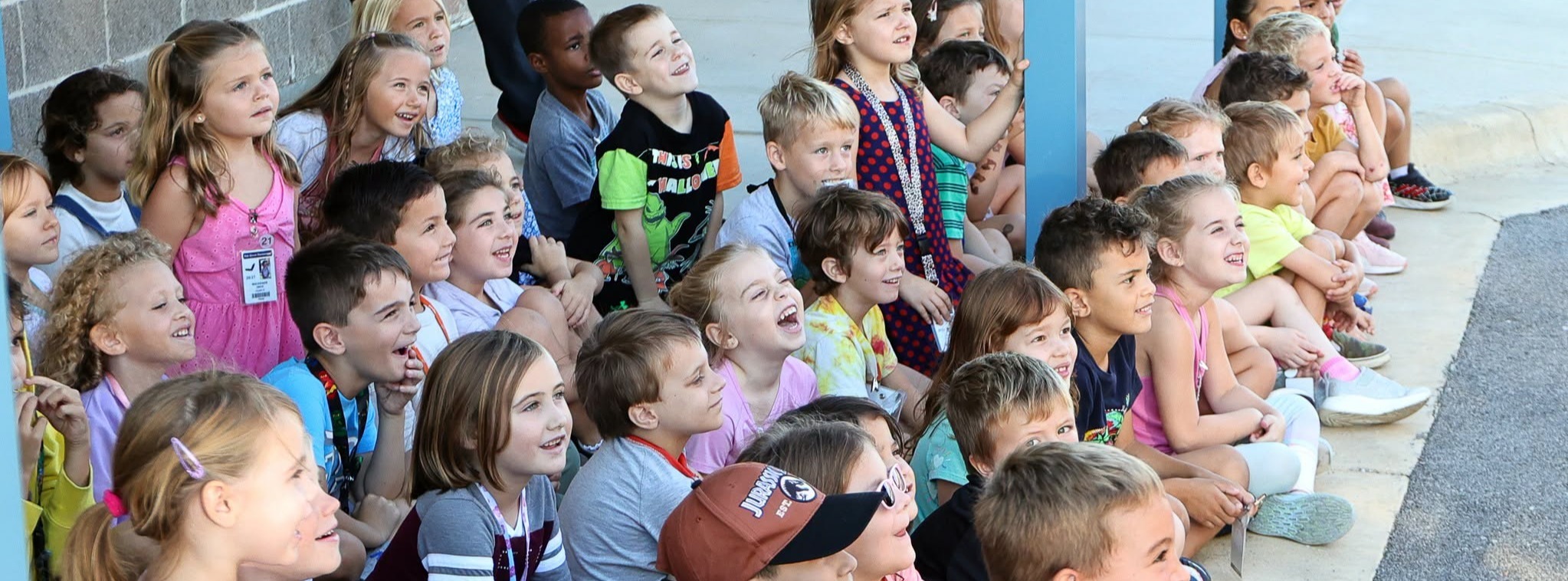 A group of students with smiles on their faces.