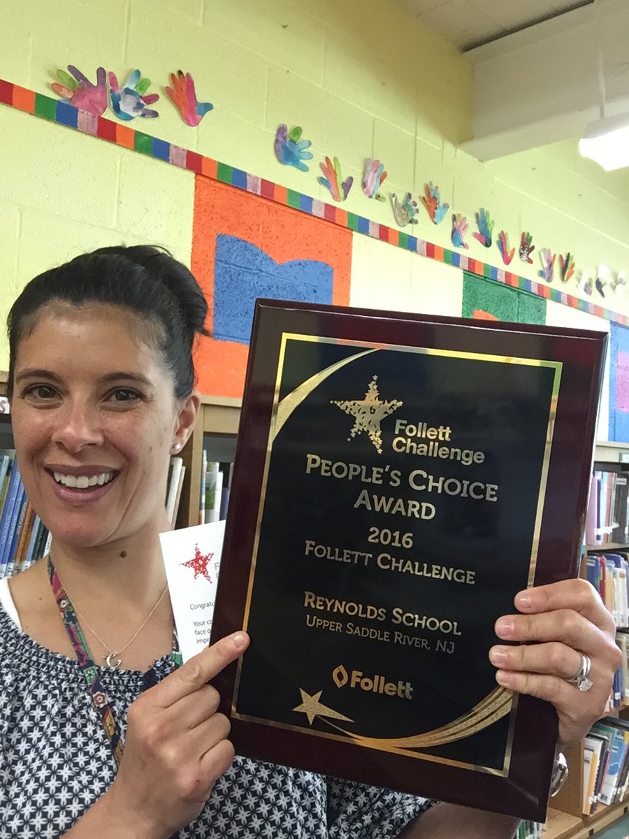 A woman smiles while holding a plaque that reads 'People's Choice Award 2016 Follett Challenge' in a colorful library setting.