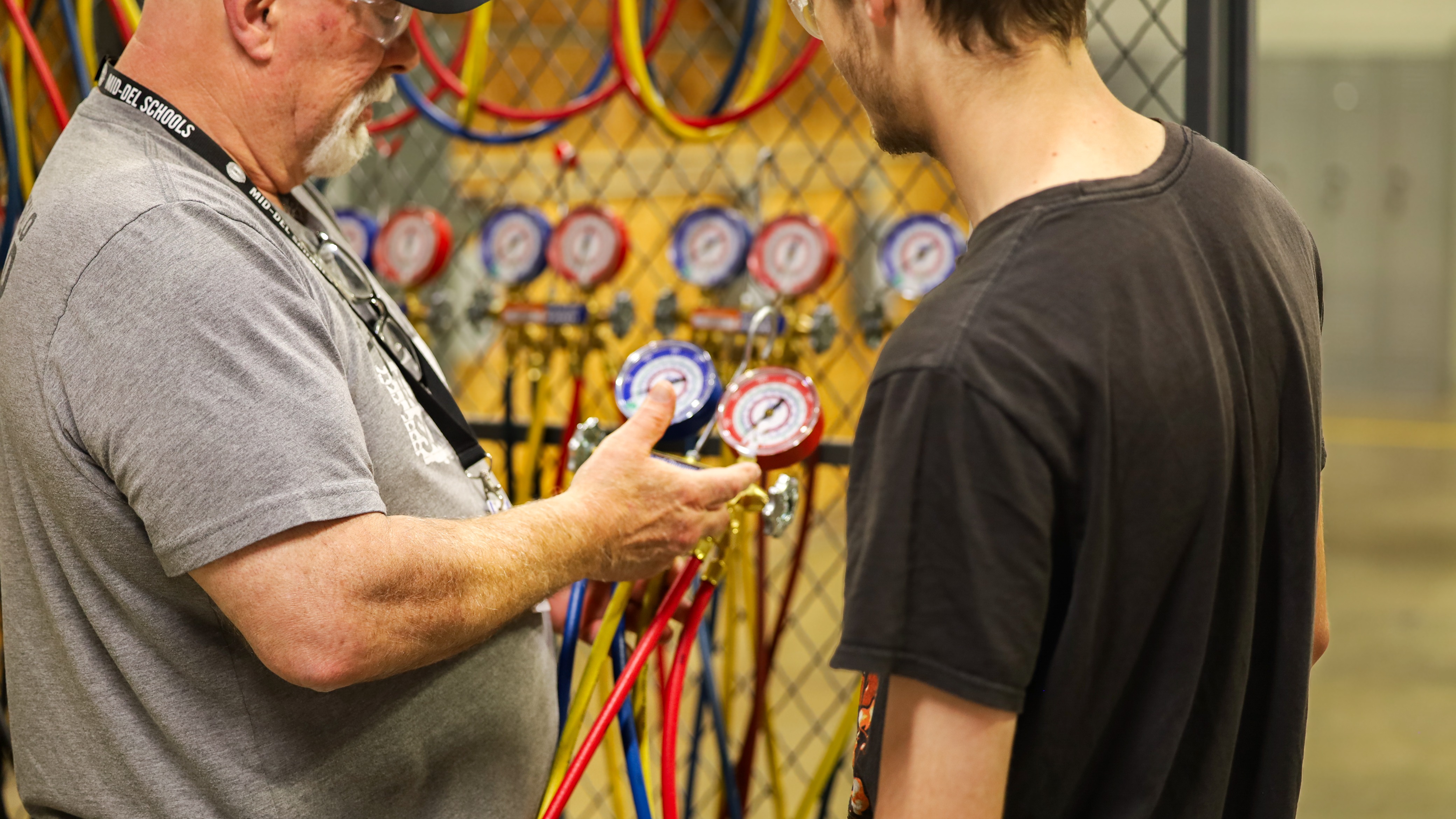 HVAC Instructor helping a student