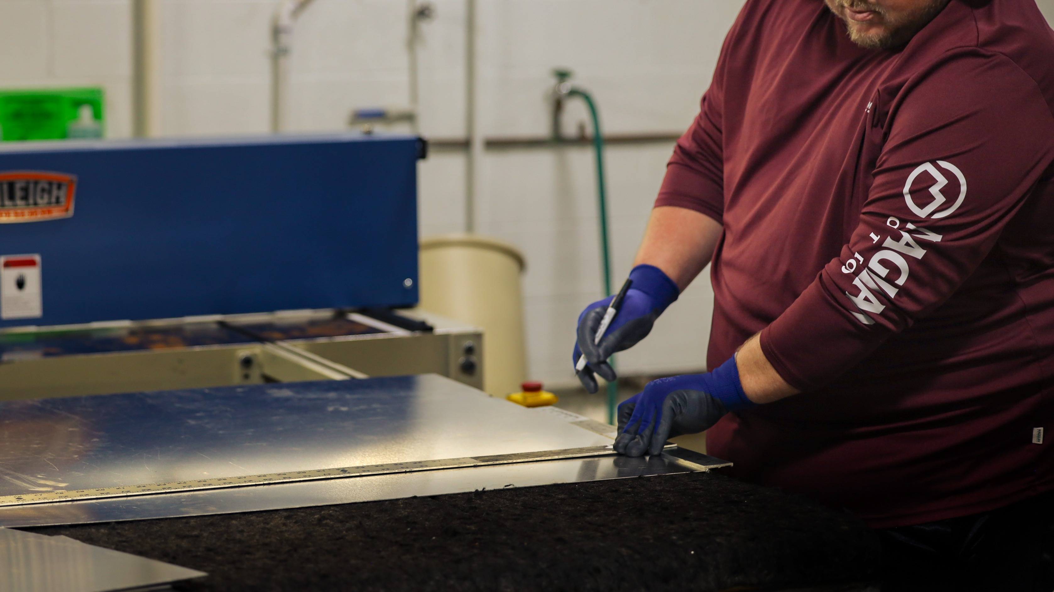 Person working with sheet metal