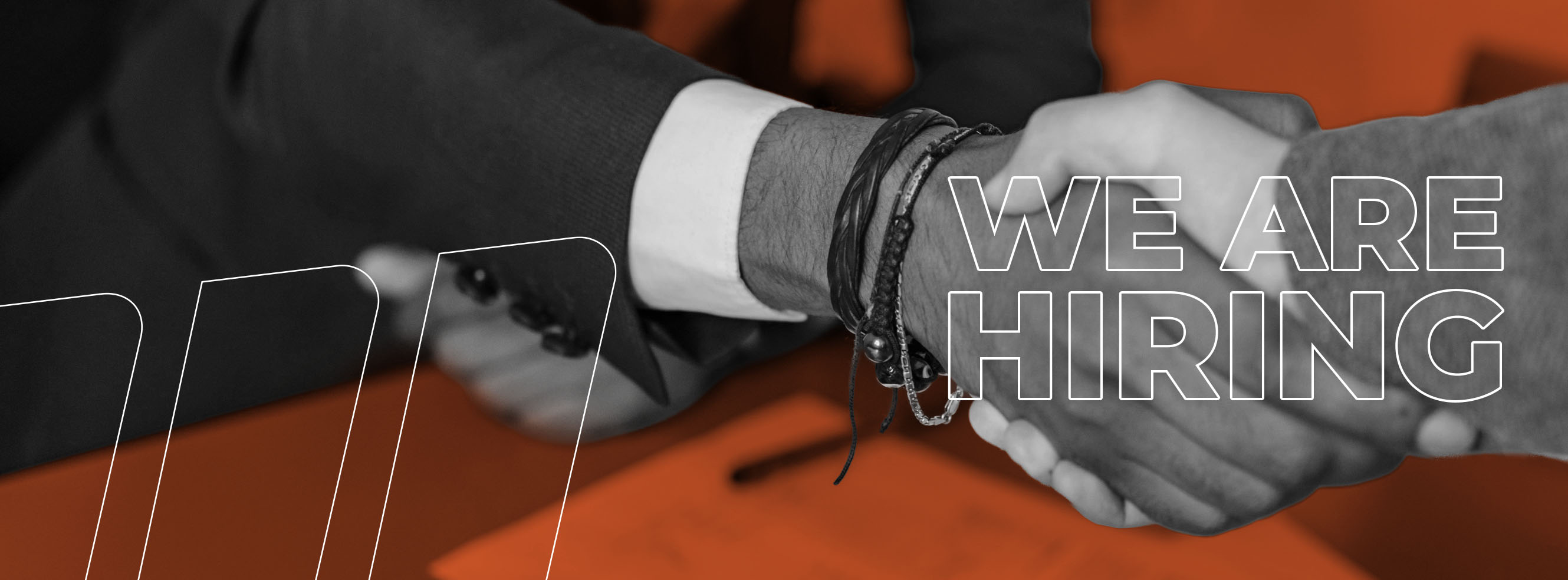 an image of a handshake with the caption "we are hiring"