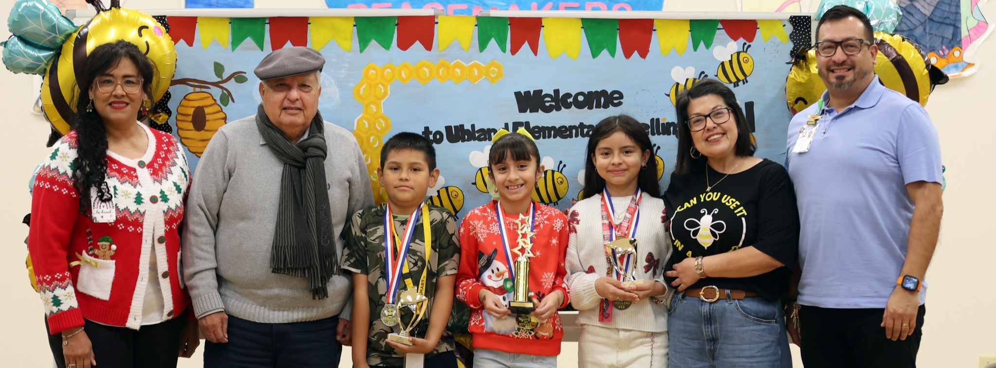 First, second and third place winners with judges and admin