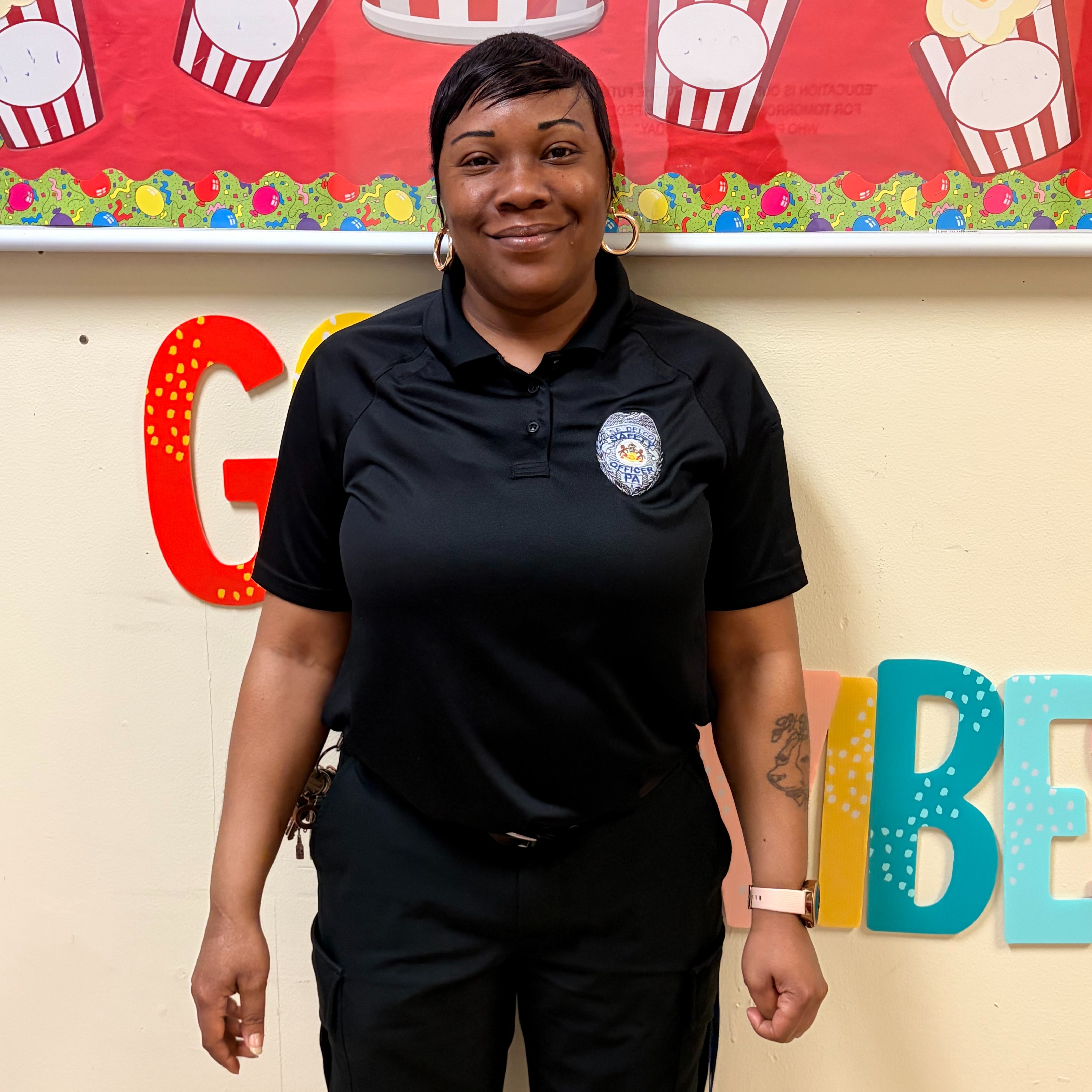 Security Officer smiling for her award photo.