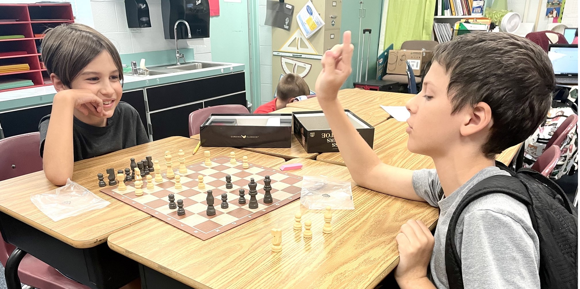 Kids playing chess