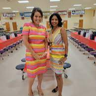 MRS> Dorsey & Mrs. Drost Smiling in the cafeteria