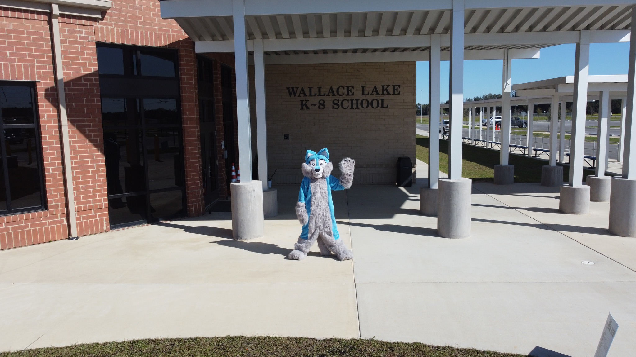 The Wallace Lake K-8 School with Mascot Wally