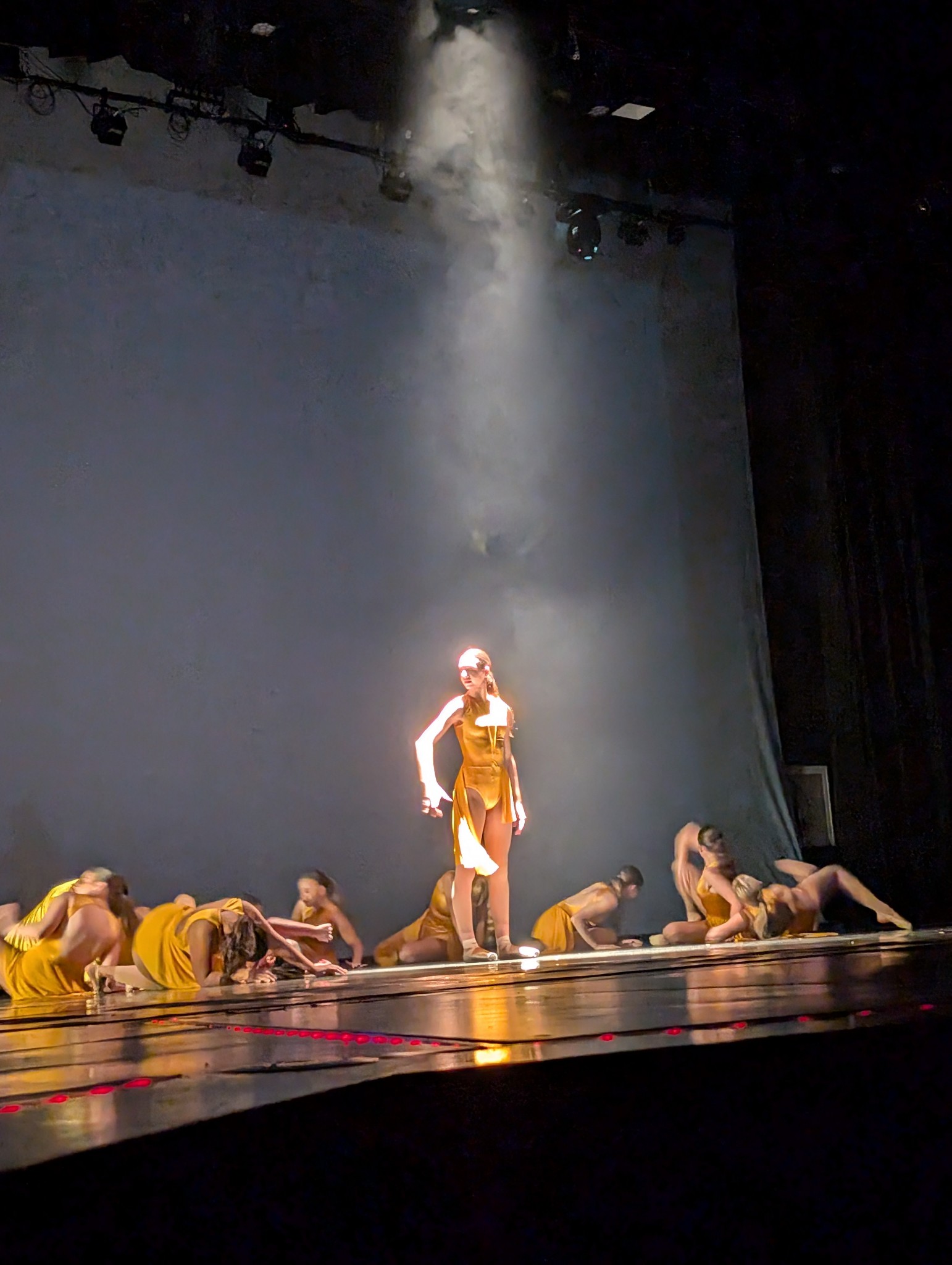 Dancer on stage in spotlight