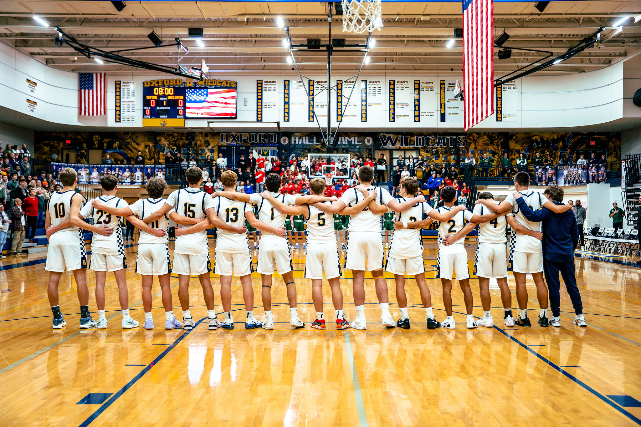 basketball team huddles