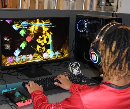 student playing on the computer