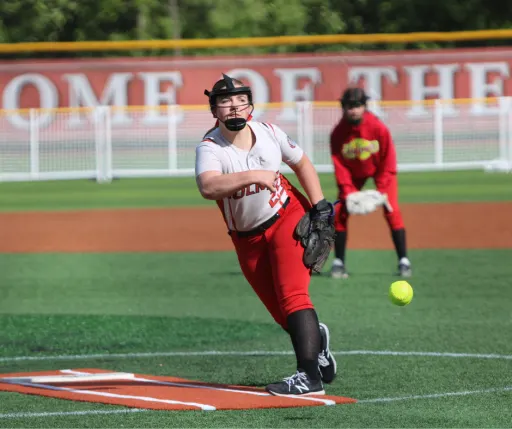 boy pitching the ball