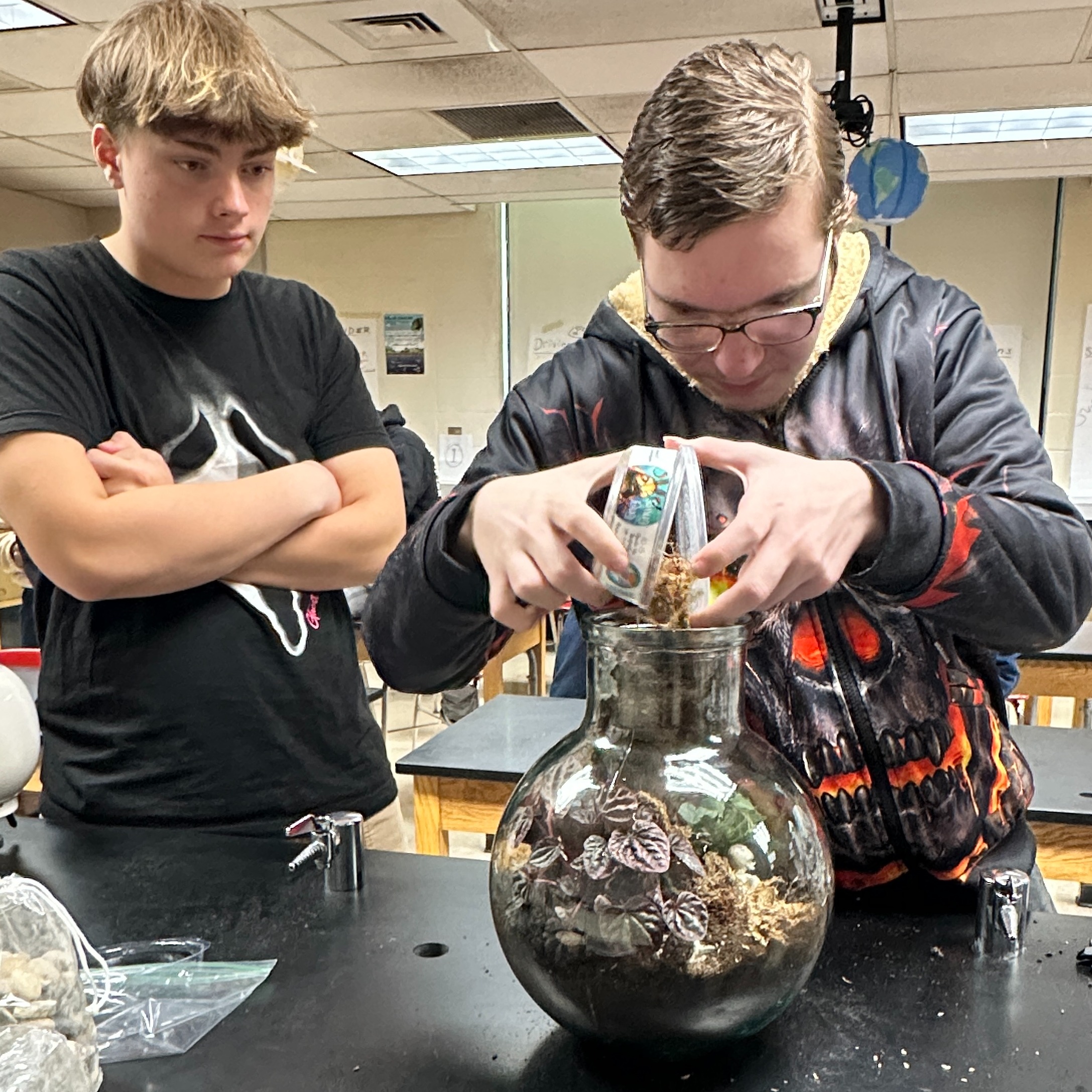 boys making a terrarium