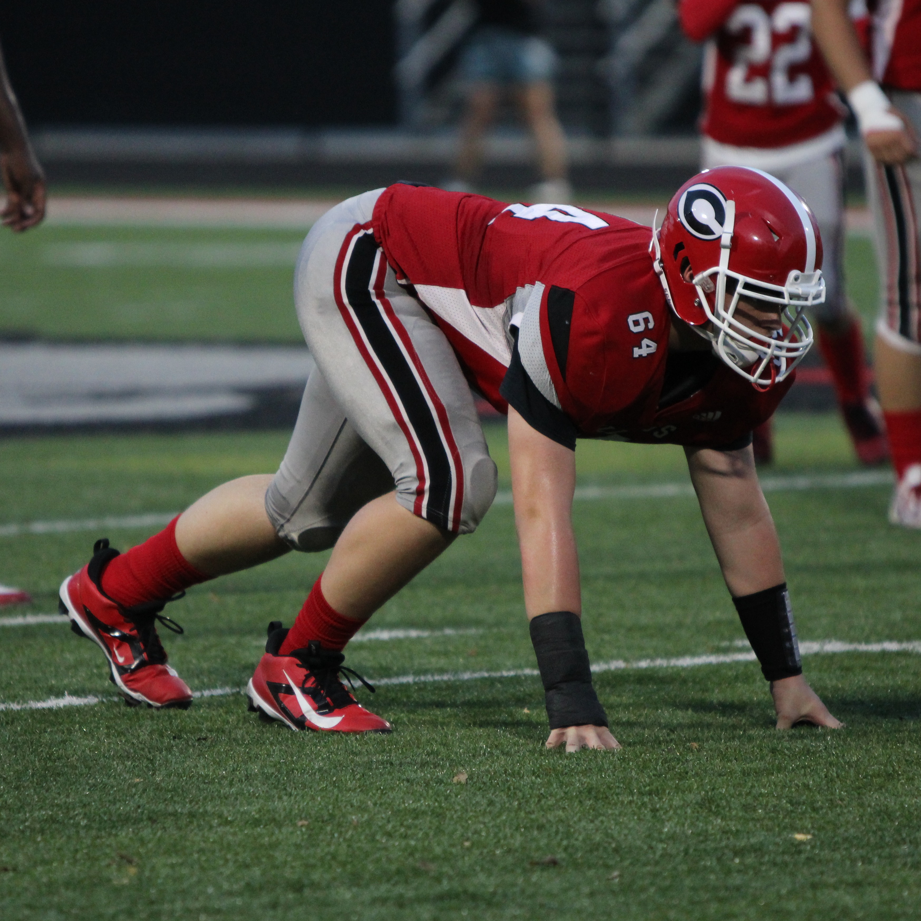 football player in ready stance
