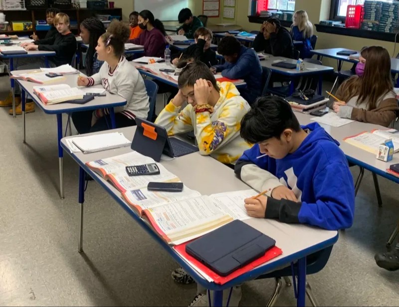 Kid working on a actgivity at the classroom