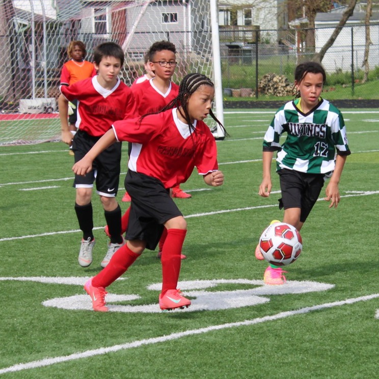 LES student playing soccer