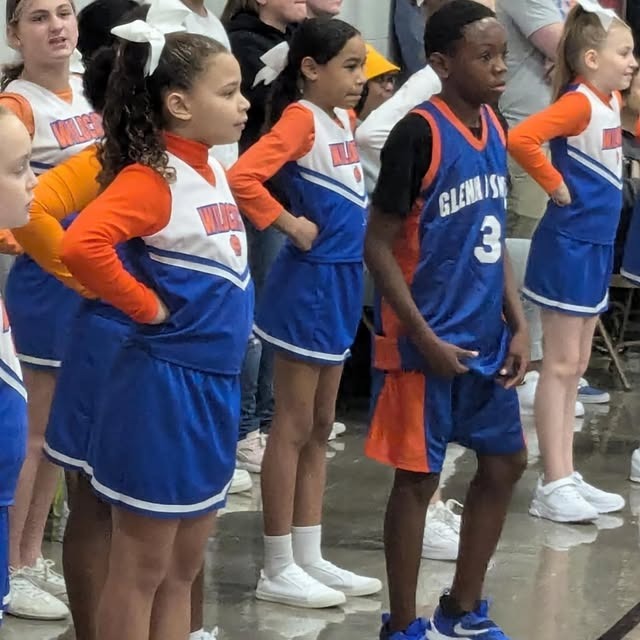 GOS cheerleaders and basketball player