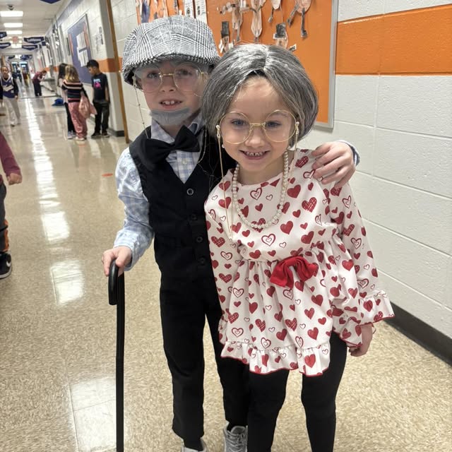 young male and female students dress like they are 100 years old